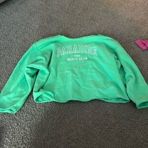 The item clearly has the top part cut to be off the shoulder